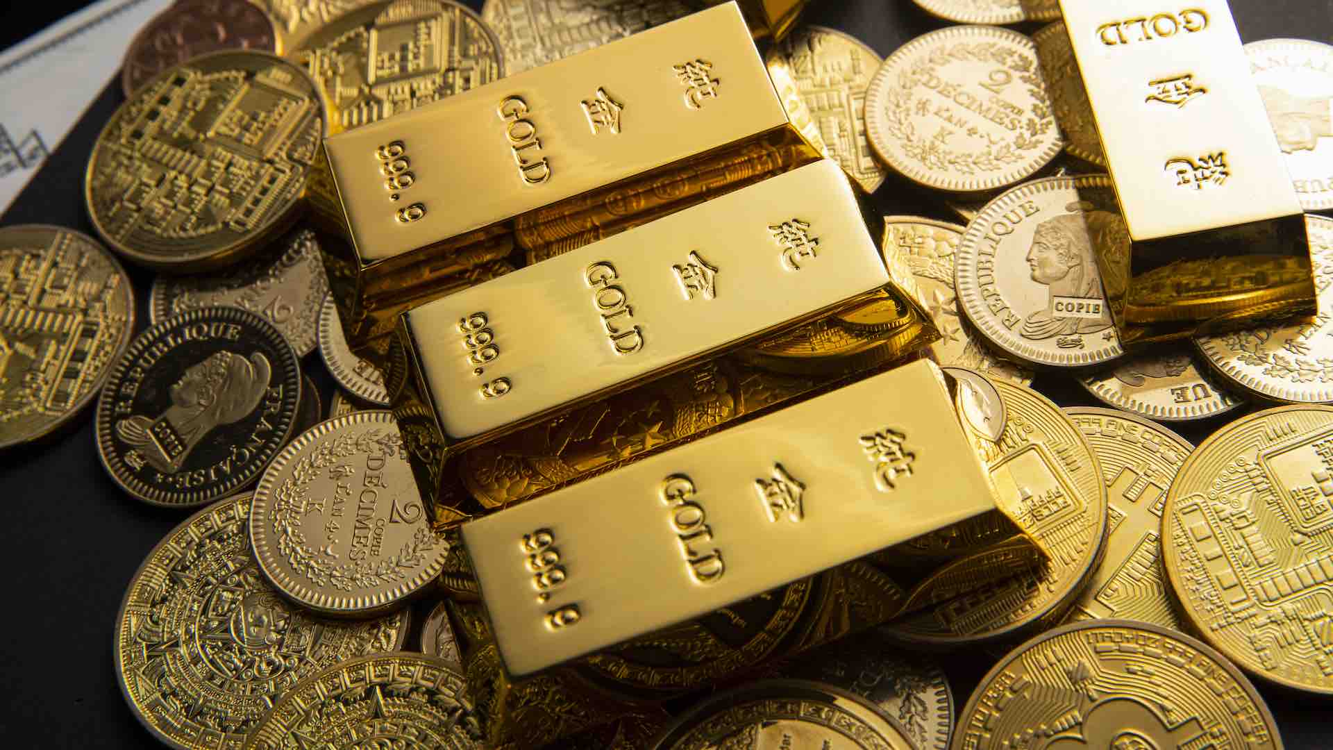 Gold prices surge to record highs, caution urged